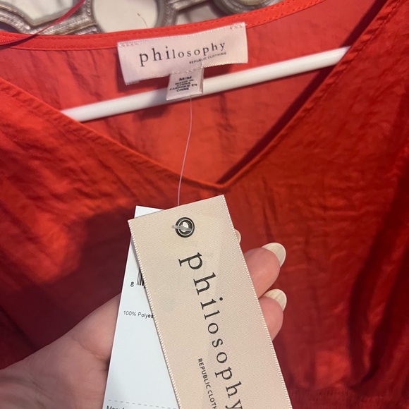 Cutest orange top! - Picture 2 of 2